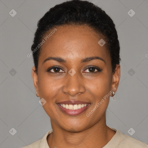 Joyful black young-adult female with short  black hair and brown eyes