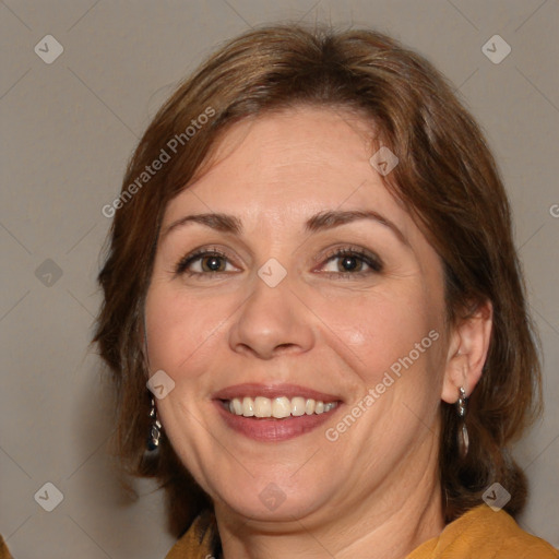 Joyful white adult female with medium  brown hair and brown eyes