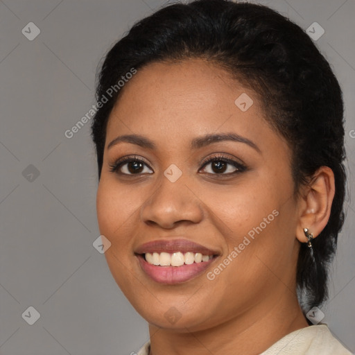 Joyful latino young-adult female with medium  black hair and brown eyes