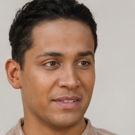 Neutral latino young-adult male with short  brown hair and brown eyes