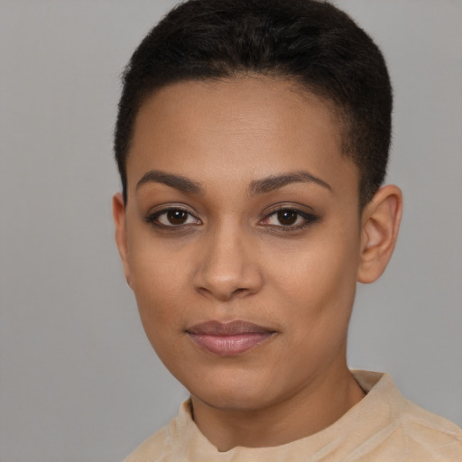 Joyful latino young-adult female with short  brown hair and brown eyes