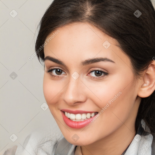 Joyful white young-adult female with medium  brown hair and brown eyes