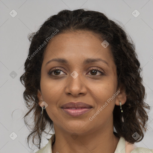 Joyful black young-adult female with medium  brown hair and brown eyes