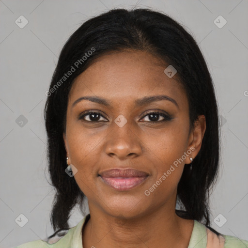 Joyful black young-adult female with medium  brown hair and brown eyes