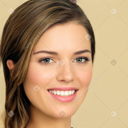 Joyful white young-adult female with long  brown hair and green eyes