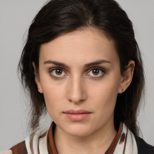 Neutral white young-adult female with medium  brown hair and brown eyes