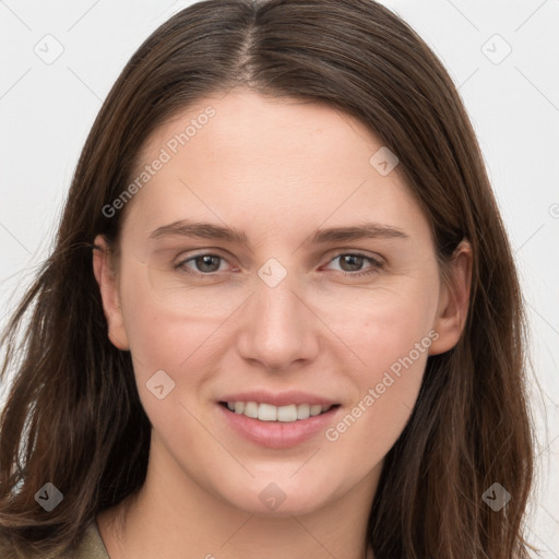 Joyful white young-adult female with long  brown hair and grey eyes