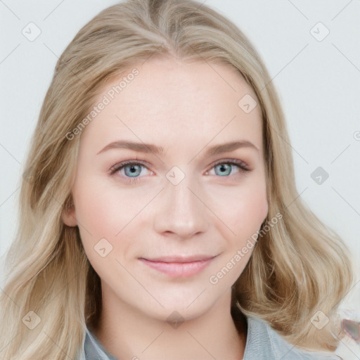 Joyful white young-adult female with long  brown hair and blue eyes