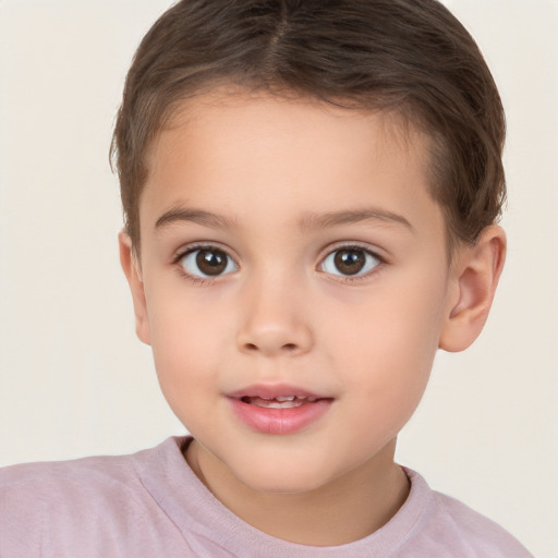 Joyful white child male with short  brown hair and brown eyes