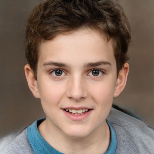 Joyful white child male with short  brown hair and brown eyes