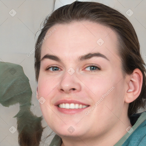 Joyful white young-adult female with medium  brown hair and blue eyes