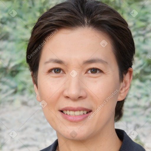 Joyful white adult female with short  brown hair and brown eyes