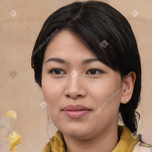 Joyful asian young-adult female with medium  black hair and brown eyes