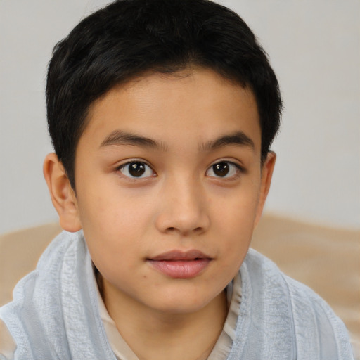 Joyful latino child female with short  brown hair and brown eyes