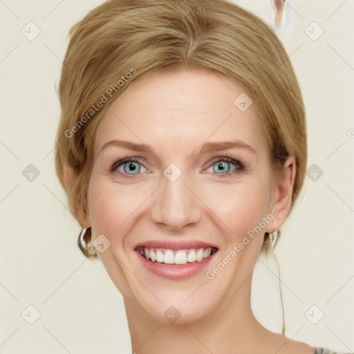 Joyful white young-adult female with medium  brown hair and green eyes