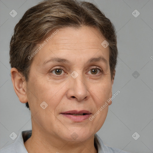 Joyful white middle-aged female with short  brown hair and brown eyes