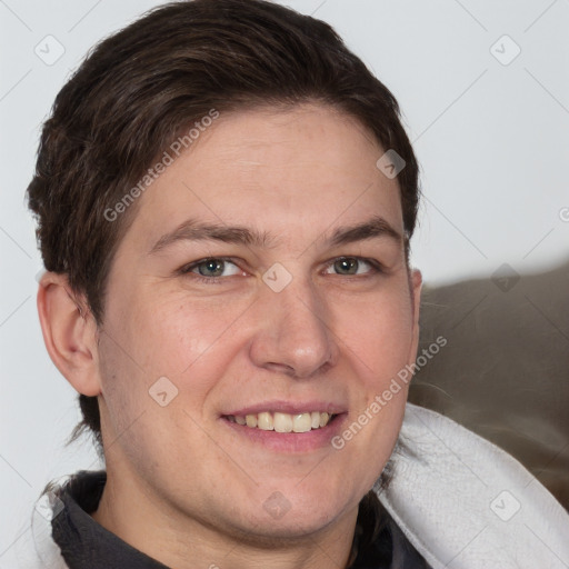 Joyful white adult male with short  brown hair and brown eyes