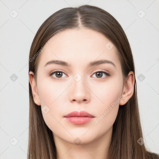 Neutral white young-adult female with long  brown hair and brown eyes