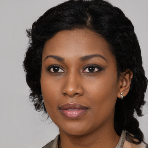 Neutral black young-adult female with medium  black hair and brown eyes