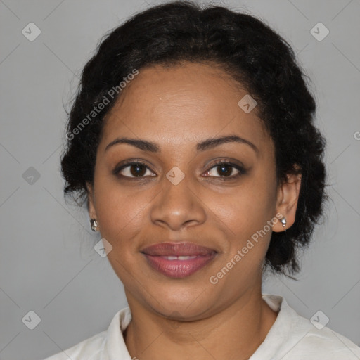 Joyful black adult female with short  black hair and brown eyes