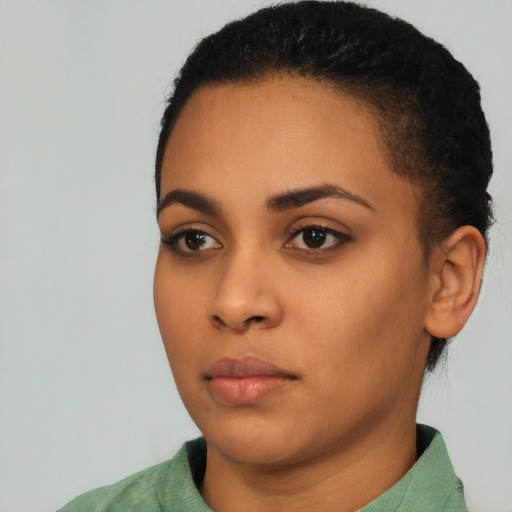 Neutral black young-adult female with short  black hair and brown eyes