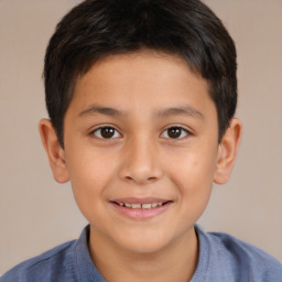 Joyful white child male with short  brown hair and brown eyes