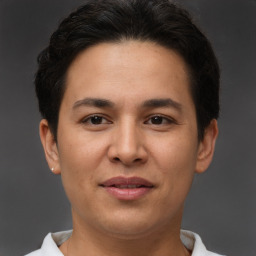 Joyful white adult female with short  brown hair and brown eyes