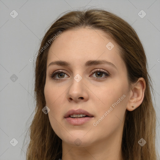 Neutral white young-adult female with long  brown hair and brown eyes