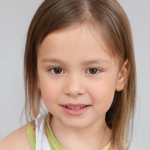 Joyful white child female with medium  brown hair and brown eyes