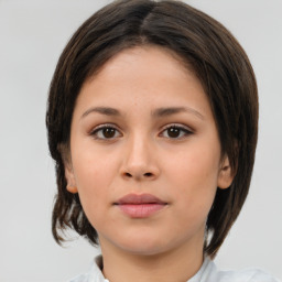 Neutral white young-adult female with medium  brown hair and brown eyes