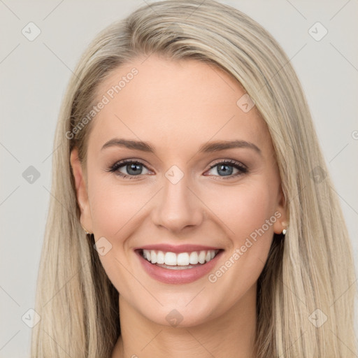 Joyful white young-adult female with long  brown hair and blue eyes