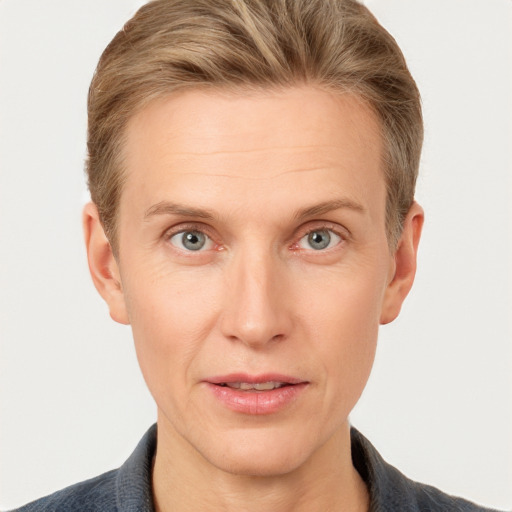 Joyful white adult male with short  brown hair and grey eyes