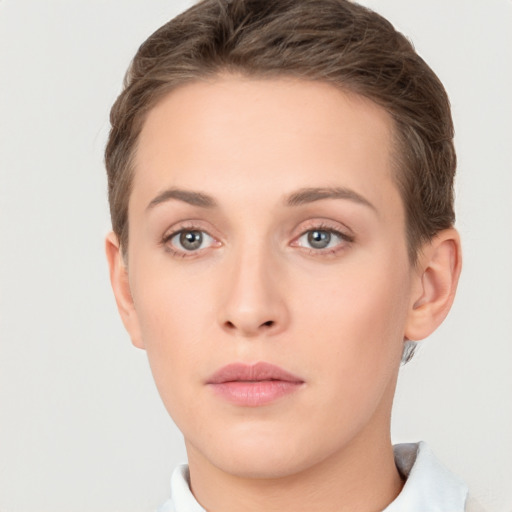 Neutral white young-adult female with short  brown hair and brown eyes