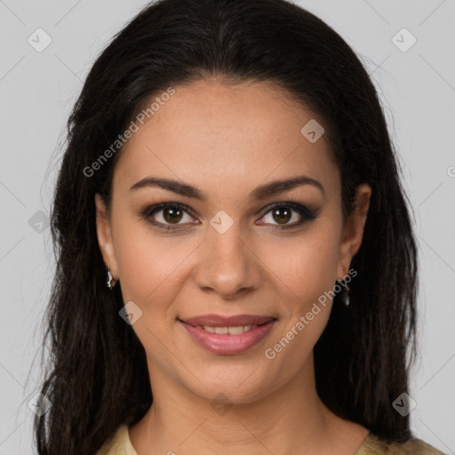 Joyful latino young-adult female with long  brown hair and brown eyes