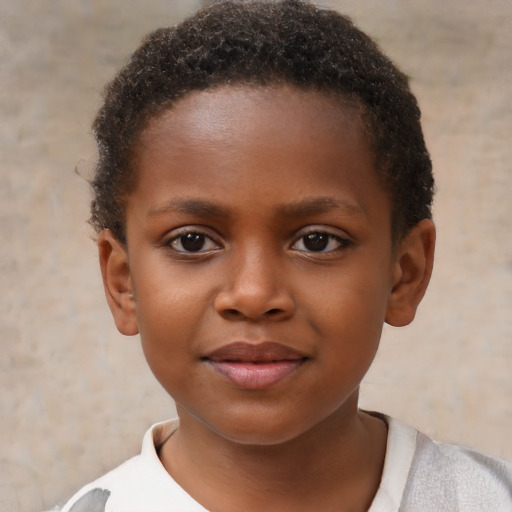 Joyful black child female with short  brown hair and brown eyes