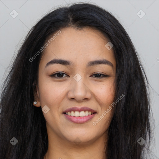 Joyful asian young-adult female with long  brown hair and brown eyes