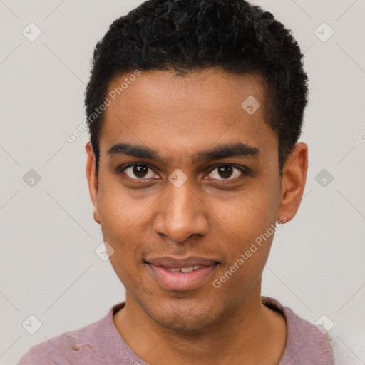 Joyful black young-adult male with short  black hair and brown eyes