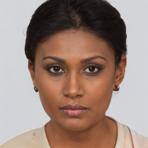 Neutral black young-adult female with short  brown hair and brown eyes