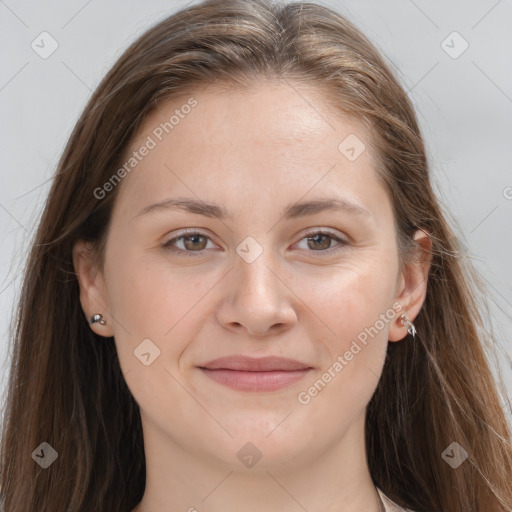 Joyful white young-adult female with long  brown hair and grey eyes