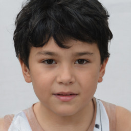 Joyful white child female with short  brown hair and brown eyes