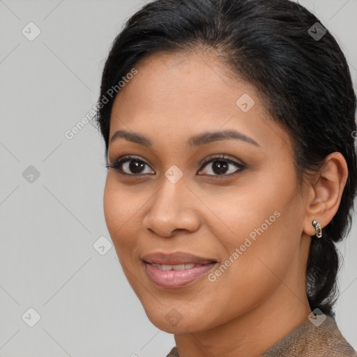 Joyful latino young-adult female with medium  black hair and brown eyes