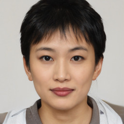 Neutral asian young-adult female with short  brown hair and brown eyes