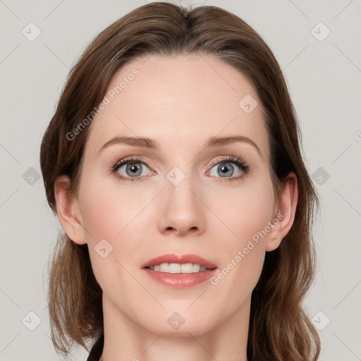 Joyful white young-adult female with medium  brown hair and blue eyes