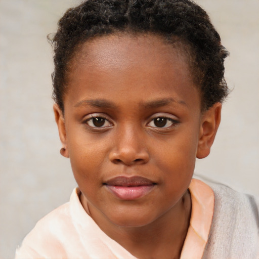 Joyful black child female with short  brown hair and brown eyes