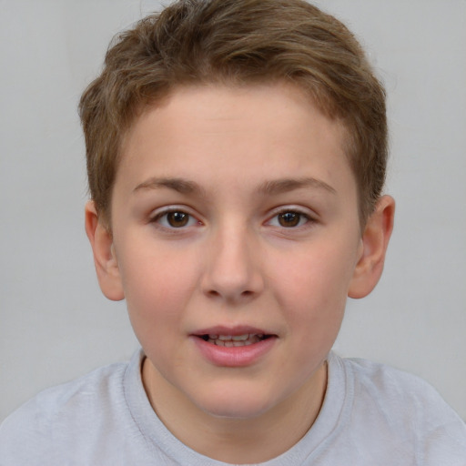 Joyful white child male with short  brown hair and brown eyes