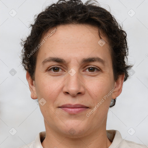 Joyful white adult female with short  brown hair and brown eyes