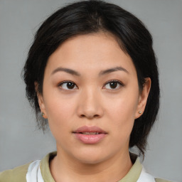 Neutral asian young-adult female with medium  brown hair and brown eyes