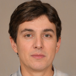 Neutral white adult male with short  brown hair and brown eyes