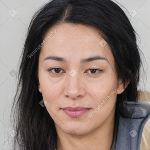 Joyful asian young-adult female with long  brown hair and brown eyes