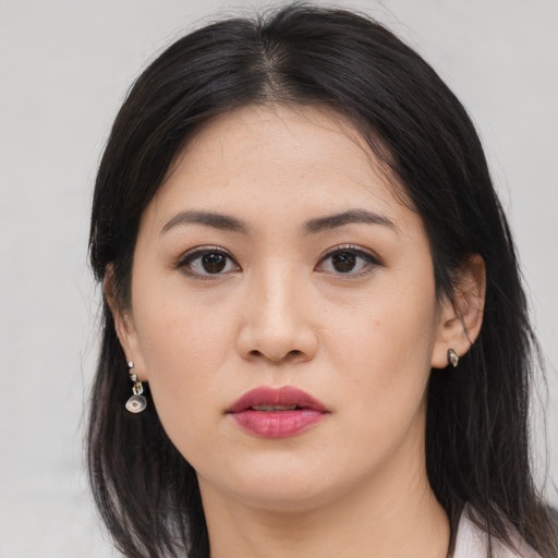 Neutral asian young-adult female with medium  black hair and brown eyes